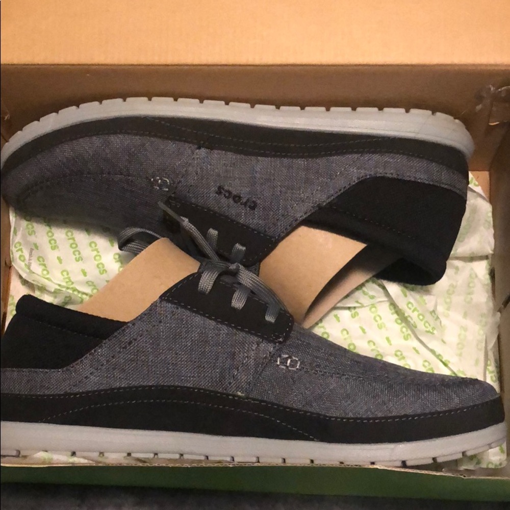 Brand new men’s size 12 Crocs
